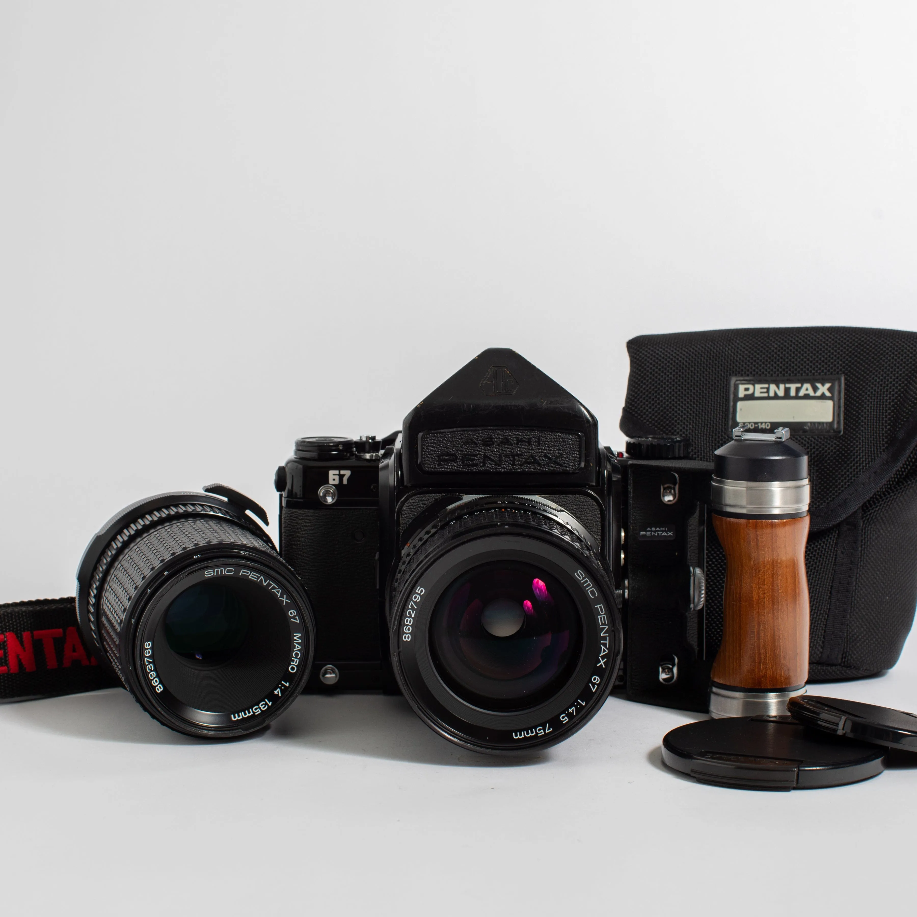 Fresh CLA: Pentax 67 MLU with 75mm f/4.5 lens, 135mm f/4 Macro lens, wooden grip, and Pentax strap